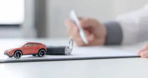 Someone completing a car finance claim