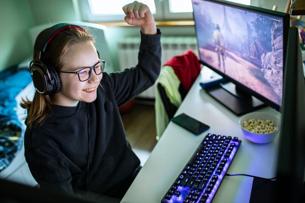 Child playing a PC video game