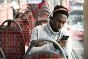 Mobile phone user on a bus